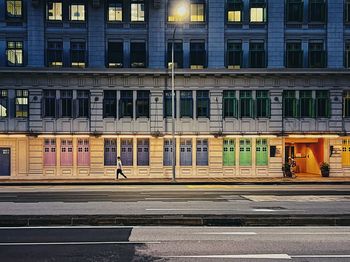 Buildings in city at night