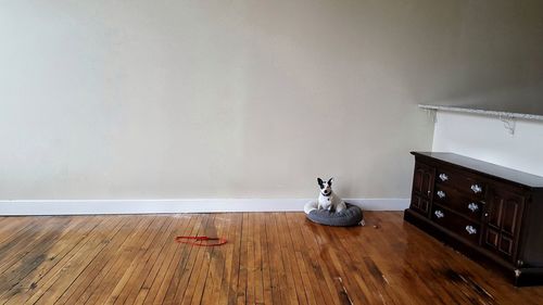 Empty wooden table on hardwood floor at home