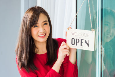 Portrait of smiling young woman