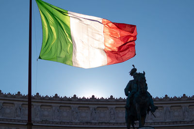 Italian flag of altare della patria monument, rome, italy