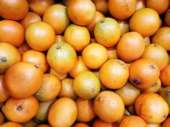 Full frame shot of oranges in market