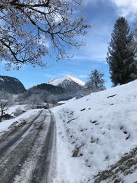 Scenic view of snow covered mountain against sky