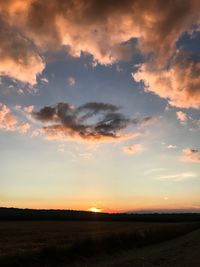 Scenic view of silhouette landscape against sky during sunset