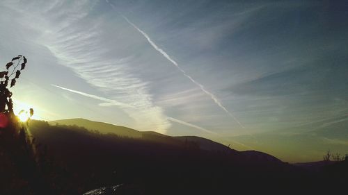 Scenic view of vapor trails against sky