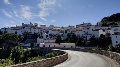 Buildings in city against sky