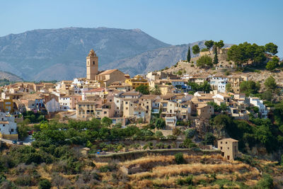 Polop old town, church and castle, surrounded by terraced fields, alicante, costa blanca, spain