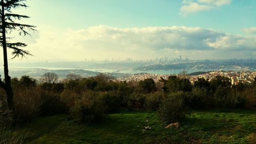 Scenic view of sea against cloudy sky