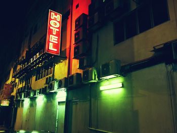 Illuminated buildings in city at night