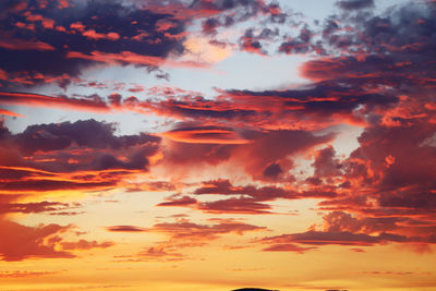 Low angle view of clouds in sky during sunset