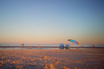 Scenic view of beach against clear sky