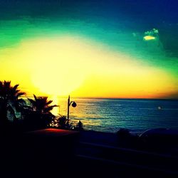 Scenic view of sea at sunset