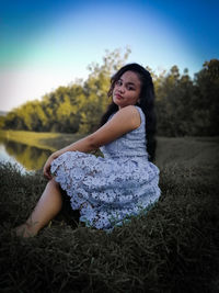Portrait of smiling girl on field