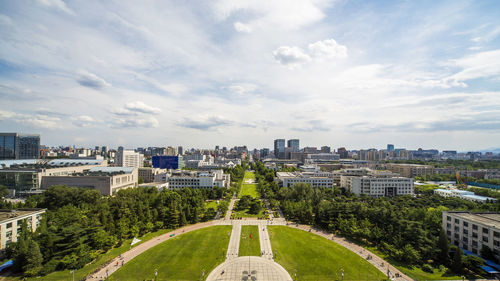 High angle view of road amidst buildings in city