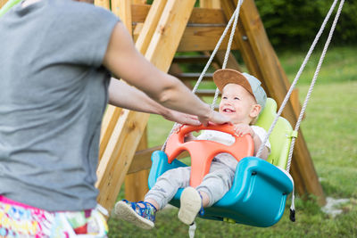 Portrait of boy playing on playground