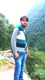 Young man standing on land