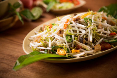 Close-up of noodles in plate on table