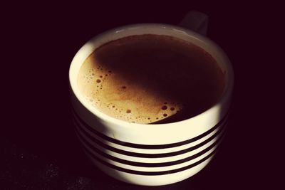 High angle view of coffee cup on table