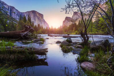 Scenic view of lake against sky during sunset