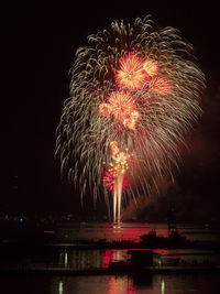 Firework display at night