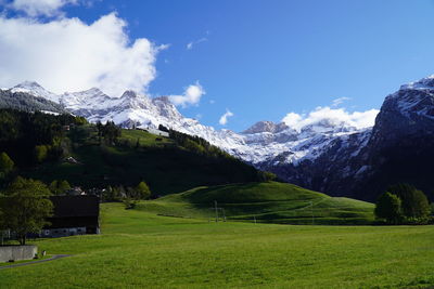 Scenic view of snowcapped mountains against sky