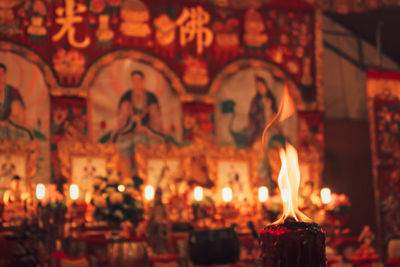 Burning candles in temple