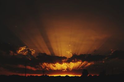 Low angle view of dramatic sky during sunset