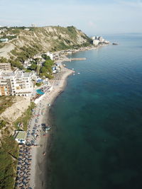 High angle view of sea and buildings against sky in durres, albania. 