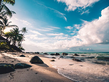 Scenic view of beach against sky