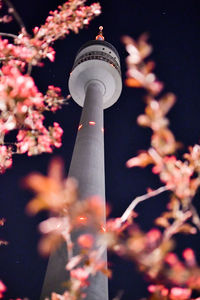 Low angle view of illuminated building at night