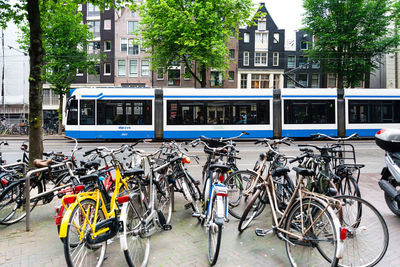 Bicycles parked on street in city