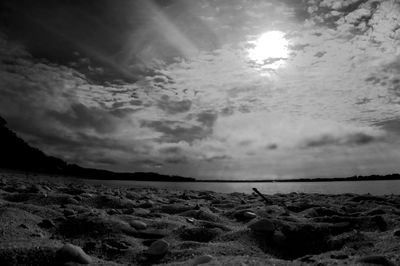 Scenic view of sea against cloudy sky