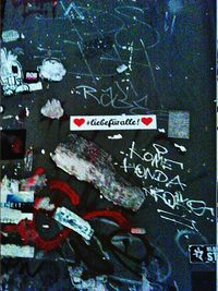 Close-up of text on wall