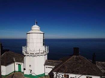 Scenic view of sea against blue sky