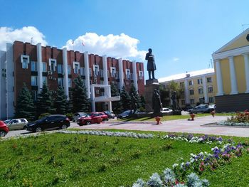 View of city buildings against sky