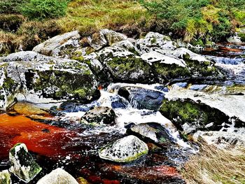 High angle view of rocks in water