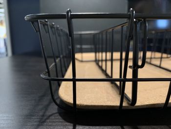 Close-up of empty chairs on table