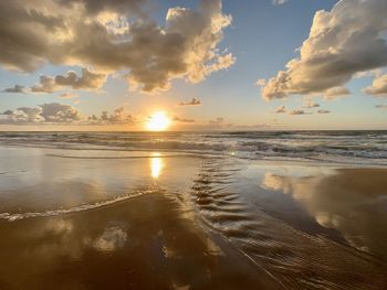 Scenic view of sea against sky during sunset