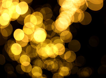 Defocused image of illuminated lights at night