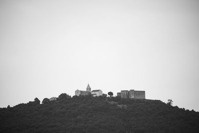 Low angle view of buildings against clear sky