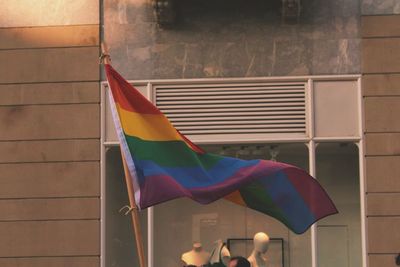 Close-up of flags against the wall