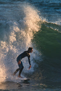 Man surfing in sea