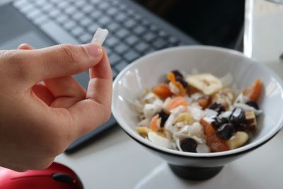 Close-up of hand holding food