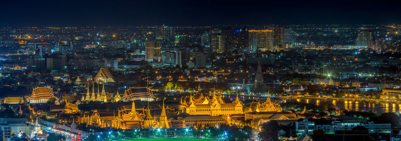 High angle view of illuminated buildings at night