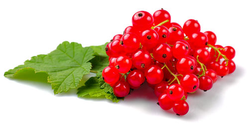 Close-up of strawberry over white background