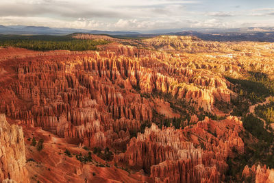 Scenic view of bryce canyon against sky during sunset
