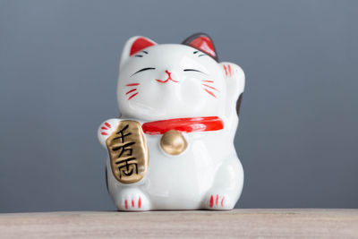 Close-up of stuffed toy against black background