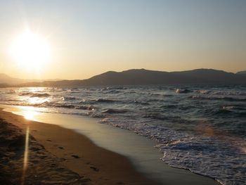 Scenic view of beach during sunset