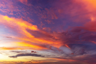 Low angle view of dramatic sky during sunset