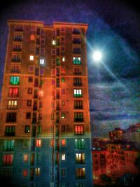 Low angle view of buildings at night