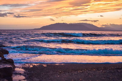 Scenic view of sea against sky during sunset